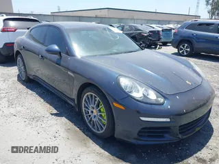 2014 Porsche Panamera S E-Hybrid with VIN WP0AD2A79EL044679, listed as a IAAI auction lot 42568320 with 90,856 mi miles and . Bid and sale history available at DreamBid. Image 1.