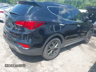 2017 Hyundai Santa Fe Ultimate z VIN 5NMZW4LA1HH052430, wystawiony jako IAAI lot #42205489 z przebiegiem 85 720 mil mil oraz . Historia ofert i sprzedaży dostępna na DreamBid. Obrazek 4.