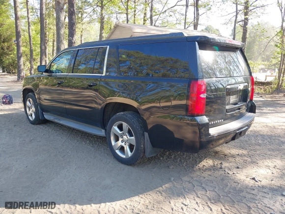 2015 Chevrolet Suburban LT with VIN 1GNSKJKC0FR238524, listed as a IAAI auction lot 42046889 with 179,676 mi miles. Bid and sale history available at carsss.com. Image 3.