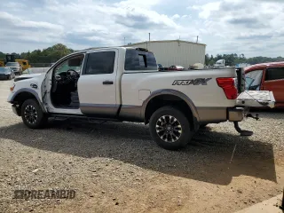 2018 Nissan Titan Platinum Reserve with VIN 1N6BA1F49JN521225, listed as a Copart auction lot 69831004 with 92,536 mi miles and Salvage title. Bid and sale history available at DreamBid. Image 2.