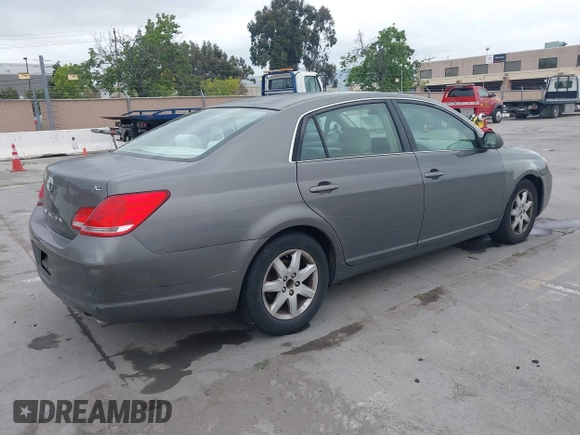 2007 Toyota Avalon XL with VIN 4T1BK36B47U175248, listed as a IAAI auction lot 42126427 with 144,284 mi miles. Bid and sale history available at carsss.com. Image 4.