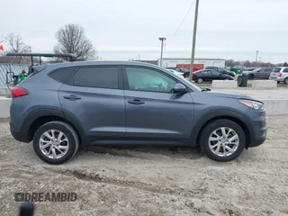 2021 Hyundai Tucson SE with VIN KM8J23A40MU299596, listed as a IAAI auction lot 41513198 with 54,284 mi miles and . Bid and sale history available at DreamBid. Image 14.