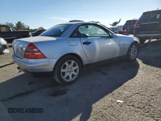 2000 Mercedes-Benz SLK-Class Kompressor with VIN WDBKK47F2YF150980, listed as a Copart auction lot 77537264 with 82,206 mi miles and Salvage Title. Bid and sale history available at carsss.com. Image 3.
