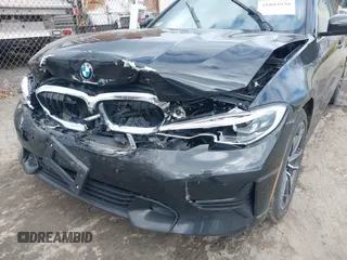 2021 BMW 3 Series 330i xDrive with VIN 3MW5R7J03M8C09356, listed as a IAAI auction lot 41804038 with 86,239 mi miles and . Bid and sale history available at DreamBid. Image 6.