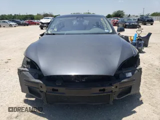 2017 Tesla Model S 100D with VIN 5YJSA1E25HF220902, listed as a Copart auction lot 56442684 with 83,297 mi miles and Salvage title. Bid and sale history available at DreamBid. Image 5.