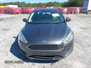 2018 Ford Focus SE z VIN 1FADP3FE1JL238012, wystawiony jako IAAI lot #42185232 z przebiegiem 143 687 mil mil oraz . Historia ofert i sprzedaży dostępna na DreamBid. Obrazek 12.