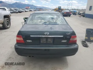 1999 Infiniti Q45 z VIN JNKBY31A6XM600579, wystawiony jako Copart lot #57683075 z przebiegiem 215 415 mil mil oraz Szkoda całkowita • Salvage title. Historia ofert i sprzedaży dostępna na DreamBid. Obrazek 6.