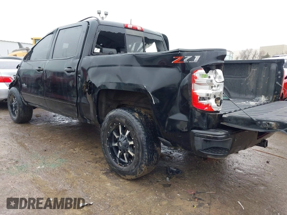 2018 Chevrolet Silverado 1500 LT with VIN 3GCUKREC7JG497399, listed as a IAAI auction lot 41497685 with 179,811 mi miles. Bid and sale history available at carsss.com. Image 3.