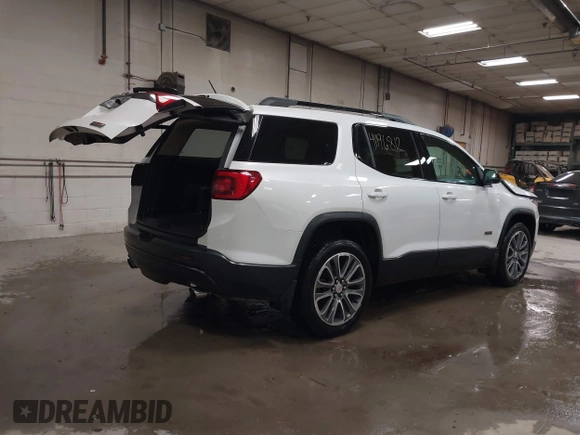 2017 GMC Acadia SLT with VIN 1GKKNVLS4HZ133716, listed as a IAAI auction lot 41196812 with 113,050 mi miles and . Bid and sale history available at carsss.com. Image 4.