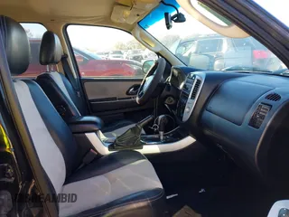 2007 Mercury Mariner Premier с VIN 4M2CU97127KJ20444, выставлен на аукционе IAAI как лот 40810464 с пробегом 163 702 миль миль и . История ставок и продаж доступна на DreamBid. Изображение 5.