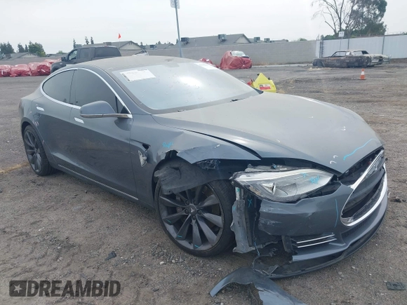 2013 Tesla Model S with VIN 5YJSA1AG5DFP13149, listed as a IAAI auction lot 42116437 with 140,999 mi miles. Bid and sale history available at carsss.com. Image 1.