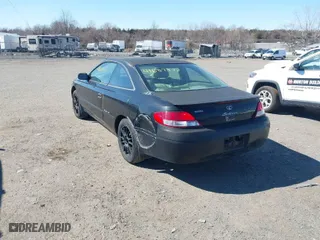 2000 Toyota Camry Solara SE with VIN 2T1CF28P9YC335686, listed as a IAAI auction lot 41689977 with 221,325 mi miles. Bid and sale history available at carsss.com. Image 3.