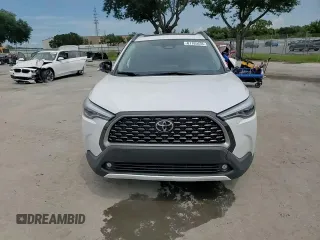 2023 Toyota Corolla Cross XLE z VIN 7MUDAAAG7PV051492, wystawiony jako Copart lot #61185635 z przebiegiem 79 364 mil mil oraz Nie do naprawy • Non repairable. Historia ofert i sprzedaży dostępna na DreamBid. Obrazek 14.