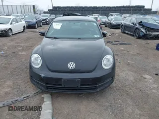 2012 Volkswagen Beetle 2.5L PZEV with VIN 3VWJP7AT0CM628169, listed as a IAAI auction lot 41628754 with 64,770 mi miles. Bid and sale history available at carsss.com. Image 12.