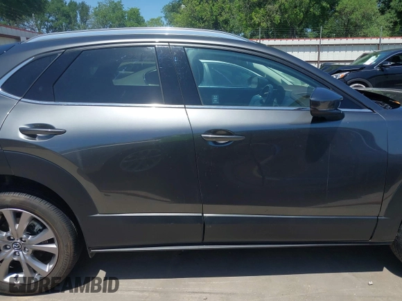 2022 Mazda CX-30 S Premium with VIN 3MVDMBDL5NM416649, listed as a IAAI auction lot 41990745 with 13,923 mi miles and . Bid and sale history available at DreamBid. Image 14.