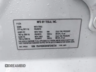 2025 Tesla Model Y Long Range with VIN 7SAYGDEDXSF248734, listed as a IAAI auction lot 41719195 with 5,876 mi miles and . Bid and sale history available at DreamBid. Image 9.