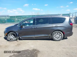 2018 Chrysler Pacifica Touring L with VIN 2C4RC1BGXJR356199, listed as a IAAI auction lot 41886721 with 111,514 mi miles and . Bid and sale history available at DreamBid. Image 14.