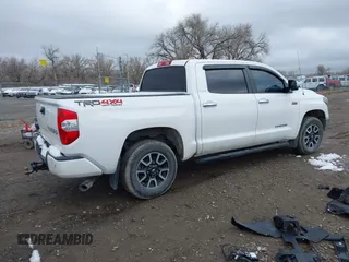 2019 Toyota Tundra SR5 z VIN 5TFHY5F17KX797348, wystawiony jako IAAI lot #41905558 z przebiegiem Nie podano mil oraz . Historia ofert i sprzedaży dostępna na DreamBid. Obrazek 4.