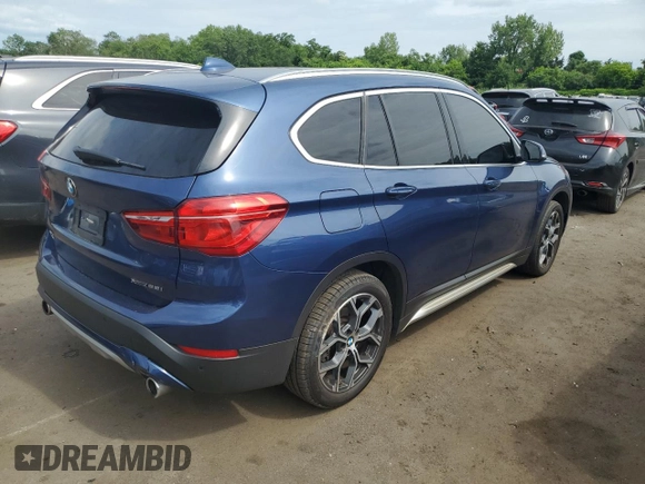 2021 BMW X1 xDrive28i with VIN WBXJG9C0XM5U47141, listed as a Copart auction lot 60645865 with 56,106 mi miles and Salvage title. Bid and sale history available at DreamBid. Image 3.