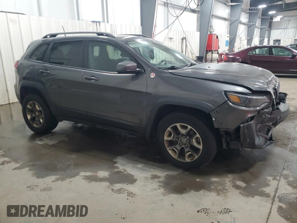 2019 Jeep Cherokee Trailhawk with VIN 1C4PJMBXXKD362555, listed as a Copart auction lot 88888565 with 120,673 mi miles and Salvage Title. Bid and sale history available at DreamBid. Image 4.