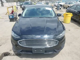 2020 Ford Fusion SE z VIN 3FA6P0LU7LR170922, wystawiony jako IAAI lot #42121025 z przebiegiem 115 799 mil mil oraz . Historia ofert i sprzedaży dostępna na DreamBid. Obrazek 12.