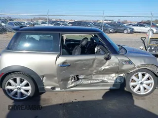 2007 MINI Hardtop S with VIN WMWMF73567TL91385, listed as a IAAI auction lot 41866865 with 114,778 mi miles and . Bid and sale history available at DreamBid. Image 13.