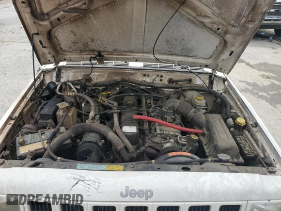 2001 Jeep Cherokee Sport с VIN 1J4FT48S21L607090, выставлен на аукционе Copart как лот 50123995 с пробегом 146 120 миль миль и Списание • Salvage title. История ставок и продаж доступна на DreamBid. Изображение 12.