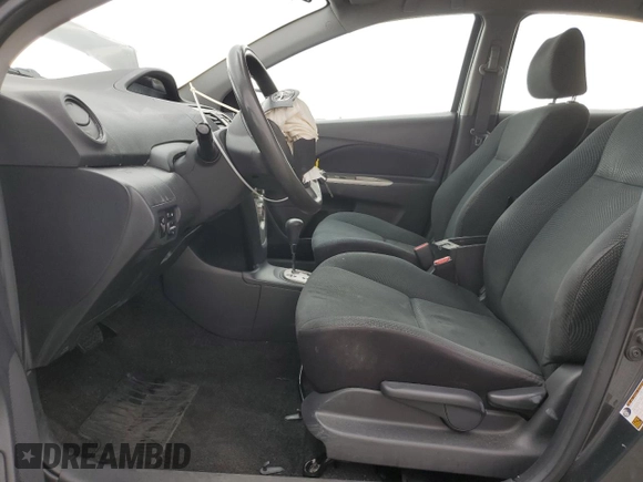 2009 Toyota Yaris with VIN JTDBT903291324461, listed as a Copart auction lot 54769875 with 141,777 mi miles and Salvage Title. Bid and sale history available at DreamBid. Image 7.