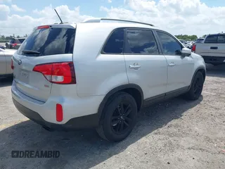 2014 Kia Sorento LX z VIN 5XYKT4A76EG502421, wystawiony jako IAAI lot #42176516 z przebiegiem 192 354 mil mil oraz . Historia ofert i sprzedaży dostępna na DreamBid. Obrazek 4.