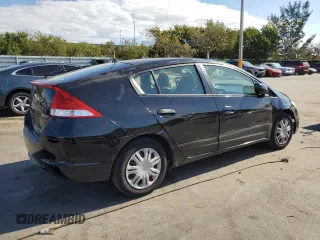 2010 Honda Insight LX with VIN JHMZE2H50AS009869, listed as a Copart auction lot 53031515 with 194,860 mi miles and Salvage Title. Bid and sale history available at DreamBid. Image 3.