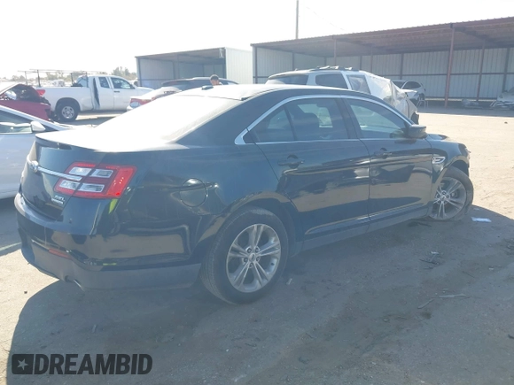 2014 Ford Taurus SEL z VIN 1FAHP2E84EG170133, wystawiony jako IAAI lot #41045369 z przebiegiem 261 732 mil mil oraz . Historia ofert i sprzedaży dostępna na DreamBid. Obrazek 4.