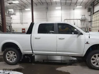 2018 Ram 2500 Laramie with VIN 3C6UR5FL1JG213467, listed as a IAAI auction lot 41513596 with 100,855 mi miles. Bid and sale history available at carsss.com. Image 14.