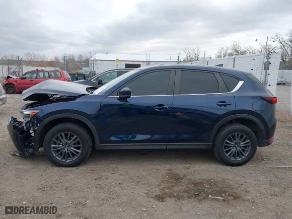 2019 Mazda CX-5 Touring with VIN JM3KFBCM4K0550054, listed as a IAAI auction lot 41071286 with NaN miles. Bid and sale history available at carsss.com. Image 14.