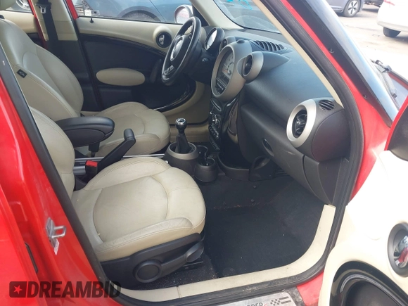 2012 MINI Countryman S with VIN WMWZC5C54CWM13041, listed as a IAAI auction lot 42244303 with 139,733 mi miles and . Bid and sale history available at DreamBid. Image 5.
