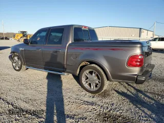2002 Ford F-150 Harley Davidson with VIN 1FTRW07372KD29243, listed as a Copart auction lot 42972905 with 164,392 mi miles and Salvage Title. Bid and sale history available at carsss.com. Image 2.