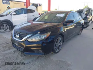 2018 Nissan Altima SV with VIN 1N4AL3APXJC297759, listed as a IAAI auction lot 41758613 with 77,527 mi miles and . Bid and sale history available at carsss.com. Image 18.