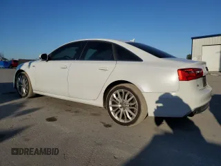 2014 Audi A6 3.0T Prestige with VIN WAUHGAFC1EN037698, listed as a Copart auction lot 45731955 with 128,050 mi miles and Clean Title. Bid and sale history available at carsss.com. Image 2.