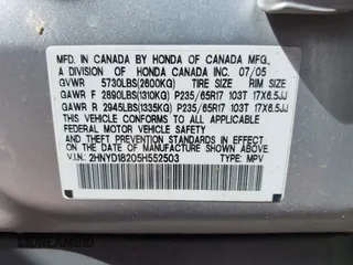 2005 Acura MDX with VIN 2HNYD18205H552503, listed as a IAAI auction lot 42004868 with 210,814 mi miles. Bid and sale history available at carsss.com. Image 9.