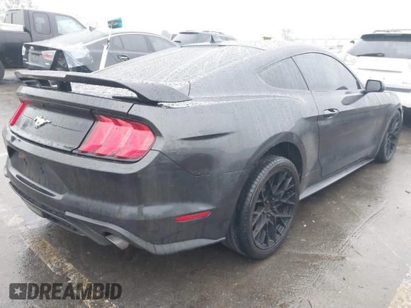 2023 Ford Mustang EcoBoost with VIN 1FA6P8TH8P5111792, listed as a IAAI auction lot 41565345 with 42,906 mi miles. Bid and sale history available at carsss.com. Image 4.