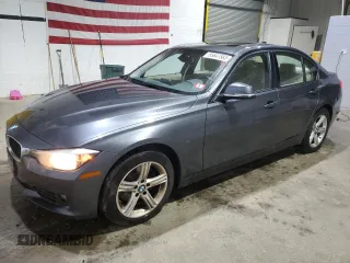 2015 BMW 3 Series 320i xDrive with VIN WBA3C3C52FP664472, listed as a Copart auction lot 55647585 with 129,934 mi miles and Salvage title. Bid and sale history available at DreamBid. Image 1.