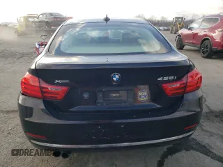 2015 BMW 4 Series 428i xDrive with VIN WBA4C9C57FG135476, listed as a Copart auction lot 82427893 with 76,405 mi miles and . Bid and sale history available at DreamBid. Image 6.