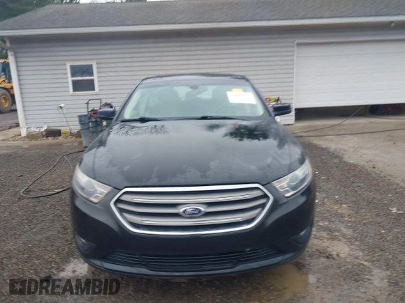 2013 Ford Taurus SEL with VIN 1FAHP2E83DG107913, listed as a IAAI auction lot 42007575 with 147,240 mi miles. Bid and sale history available at carsss.com. Image 13.