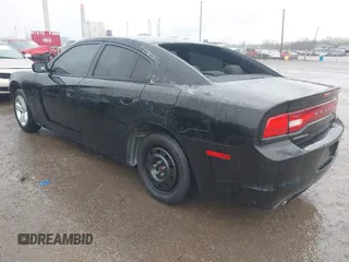 2014 Dodge Charger SE with VIN 2C3CDXBG6EH241332, listed as a IAAI auction lot 41962143 with 152,649 mi miles and . Bid and sale history available at carsss.com. Image 3.