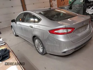 2015 Ford Fusion SE Hybrid with VIN 3FA6P0LU4FR151040, listed as a IAAI auction lot 41376155 with 120,486 mi miles. Bid and sale history available at carsss.com. Image 3.