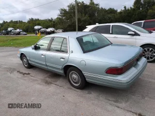1996 Mercury Grand Marquis GS with VIN 2MELM74W5TX653873, listed as a Copart auction lot 74659254 with 86,589 mi miles and Salvage Title. Bid and sale history available at DreamBid. Image 2.
