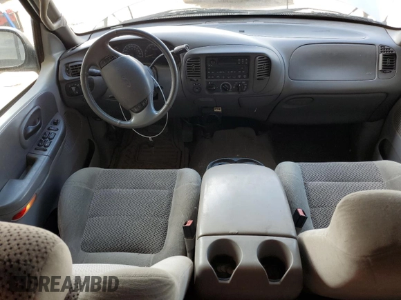 2001 Ford F-150 XLT with VIN 1FTRW08L41KB76026, listed as a Copart auction lot 63526545 with 174,126 mi miles and Clean title. Bid and sale history available at DreamBid. Image 8.