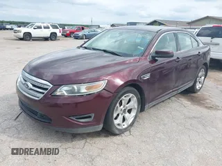 2011 Ford Taurus SEL with VIN 1FAHP2EW6BG120022, listed as a IAAI auction lot 42086866 with 271,643 mi miles. Bid and sale history available at carsss.com. Image 2.