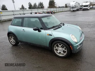 2002 MINI Hardtop with VIN WMWRC33482TC36332, listed as a Copart auction lot 42811115 with 203,708 mi miles and Salvage Title. Bid and sale history available at DreamBid. Image 4.