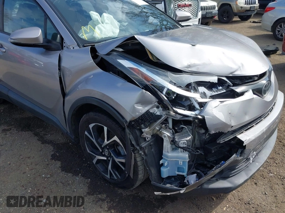 2018 Toyota C-HR XLE with VIN NMTKHMBX6JR057321, listed as a IAAI auction lot 41894322 with 50,606 mi miles. Bid and sale history available at carsss.com. Image 6.