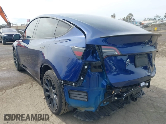 2022 Tesla Model Y Long Range with VIN 7SAYGDEE0NA019067, listed as a IAAI auction lot 41645198 with 49,336 mi miles and . Bid and sale history available at DreamBid. Image 3.